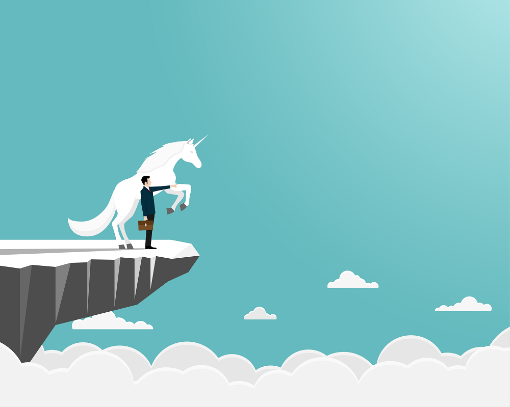 Man in a suit standing at the edge of a cliff next to a unicorn